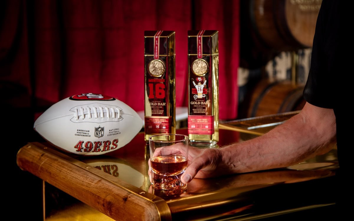 Shot glass on a bar with San Francisco 49ers branded football